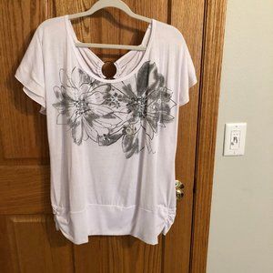 White top with black/silver decor and back detail